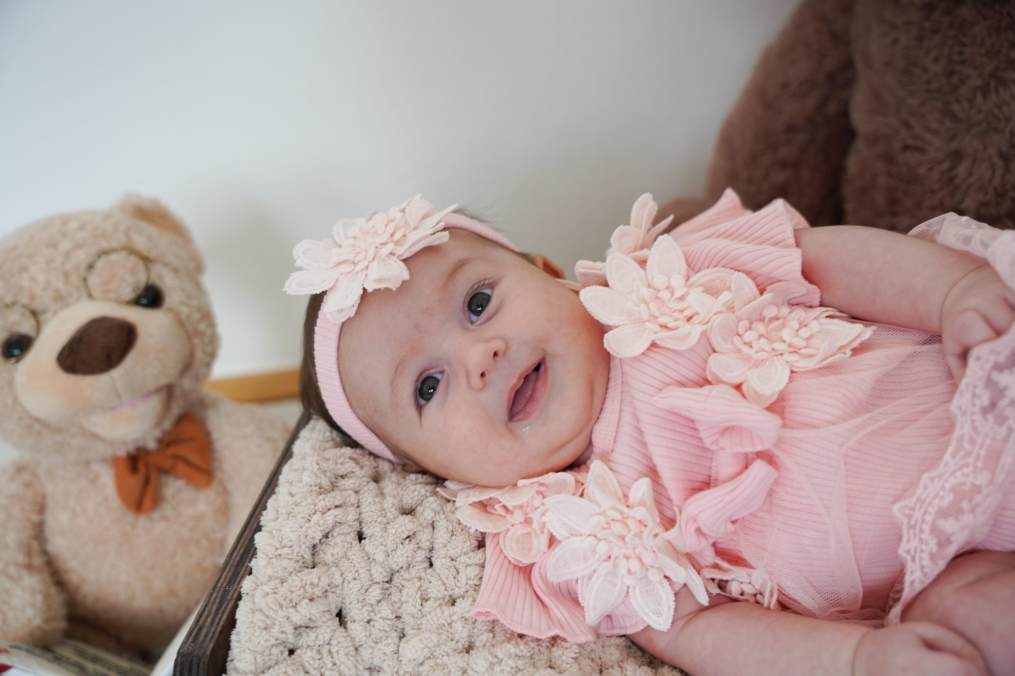 Baby mit Teddy
